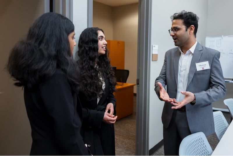 Three students talking