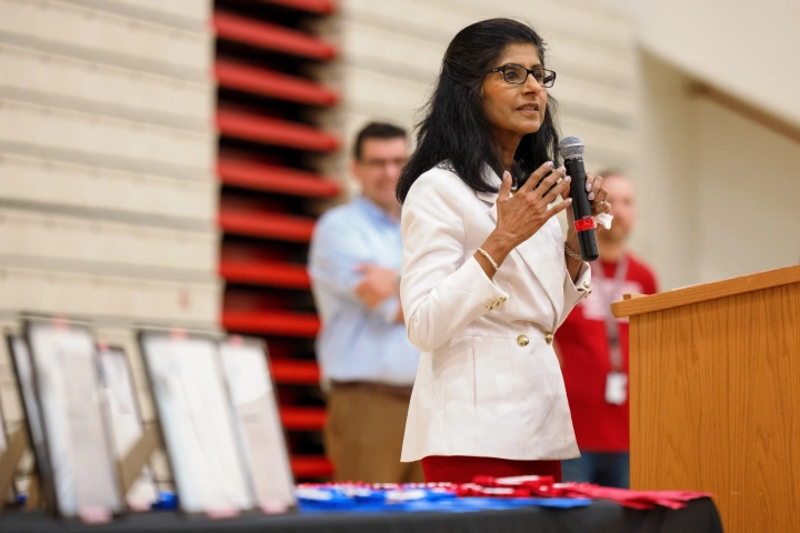 Chancellor Ramchand stands at a podium speaking
