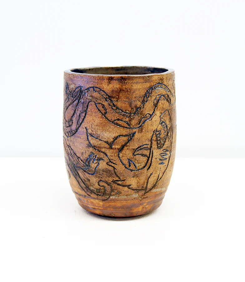 Vase created by Jourdan Armstrong with carvings of sea creatures from C206 Beginning Wheel