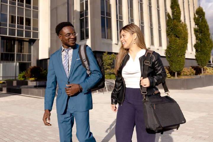 Two business students walking in downtown Indianapolis