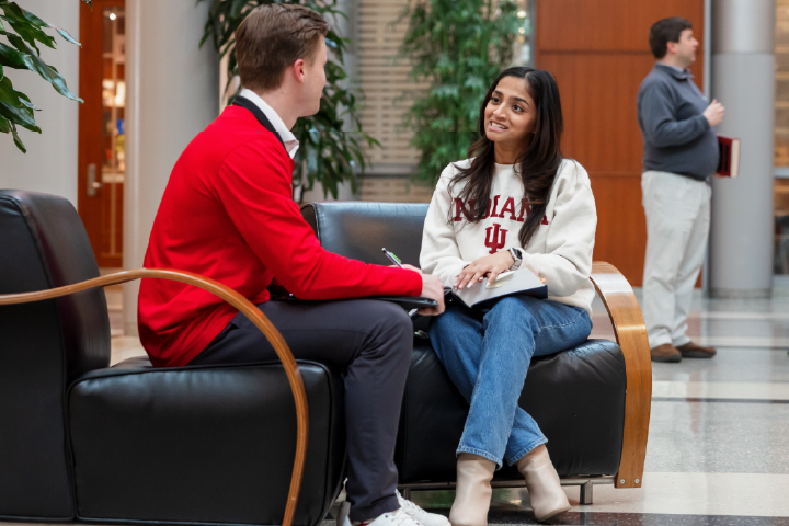 Student talking to advisor.